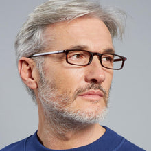 Load image into Gallery viewer, Male Model wearing Quick 7.9 reading glasses, black. Available at ReadingGlasses.CO/