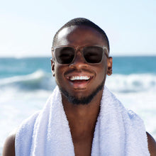 Load image into Gallery viewer, Pebble Crystal Unisex Sunglasses on Model, ReadingGlasses.CO/