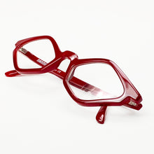 Load image into Gallery viewer, Angular view of Edgy cat eye reading glasses photographed on a white background. Made in Italy by Nannini. Buy them at ReadingGlasses.CO/