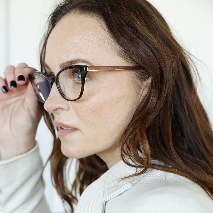 Female model wearing Essex St. Optical reading glasses. Buy them at ReadingGlasses.CO/