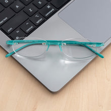 Load image into Gallery viewer, Aqua Gels reading glasses on a laptop. But at Reading Glasses.CO/