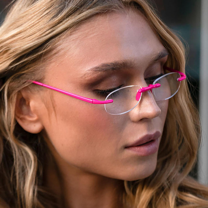Female model showing pink peony Gels from Scojo. Buy them at ReadingGlasses.CO/