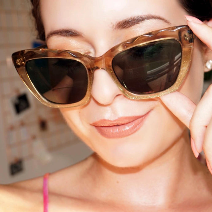 Female model wearing Vandam St. Gold Dust sun reading glasses. Buy at ReadingGlasses.CO 