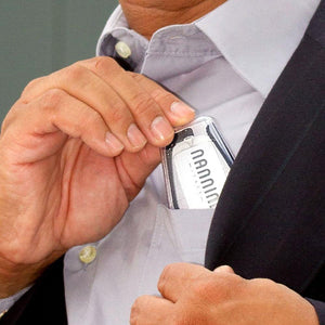 Man inserting Nannini Compact 1 in pocket